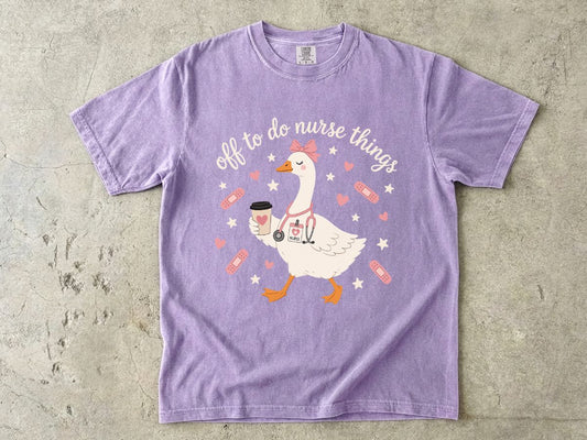 Nurse Goose Tee – Cute Medical Duck with Coffee & Bandages T-Shirt