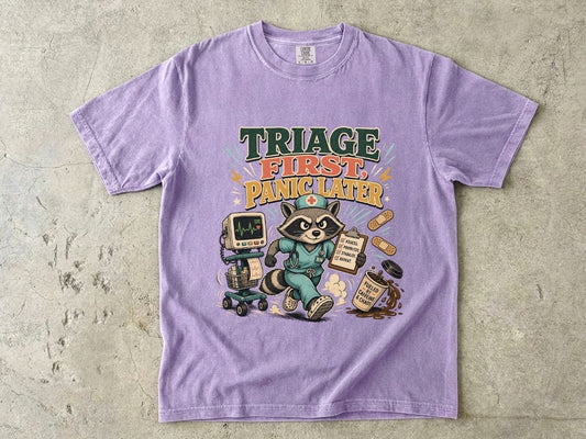 Triage First, Panic Later T-Shirt — Cute Raccoon ER Medic Graphic Tee