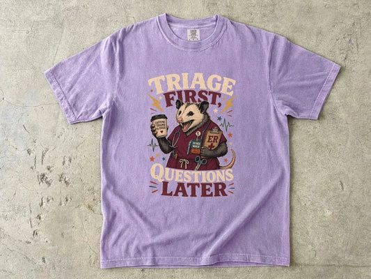 T-Shirt — "Triage First, Questions Later" Plague Doctor Medical Humor Tee