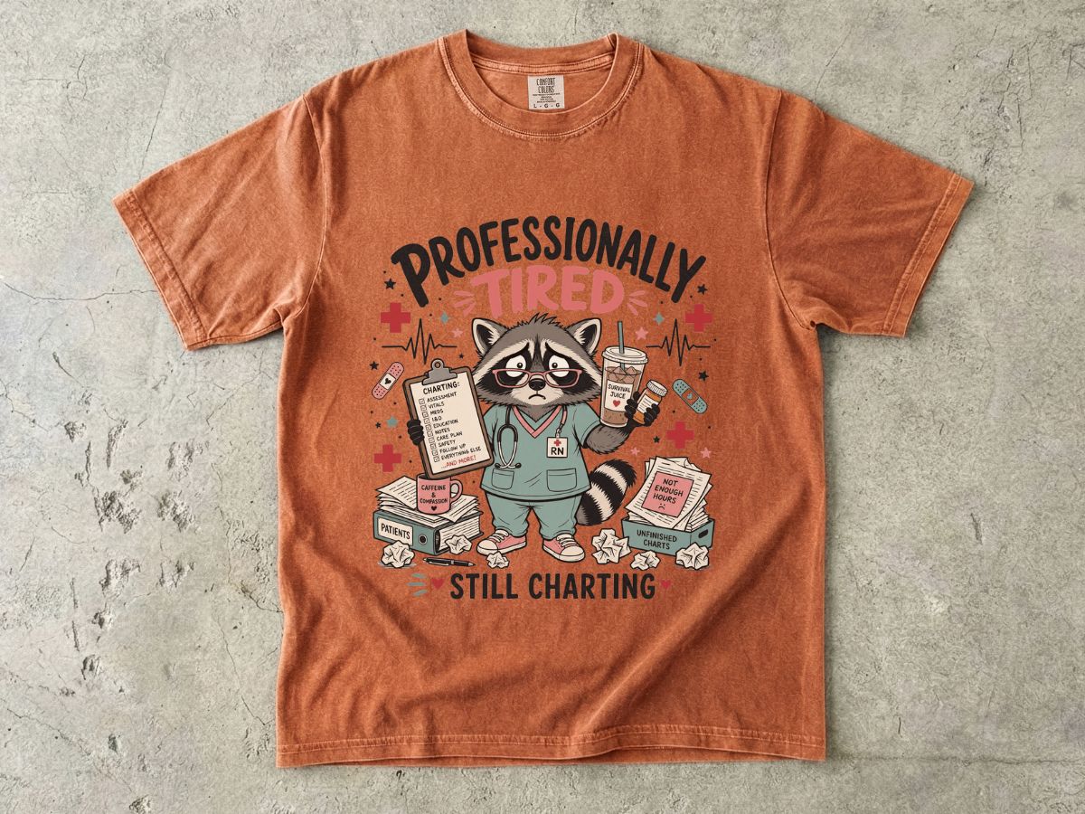 Professionally Tired Still Charting T-Shirt — Cute Raccoon Nurse Medical Tee