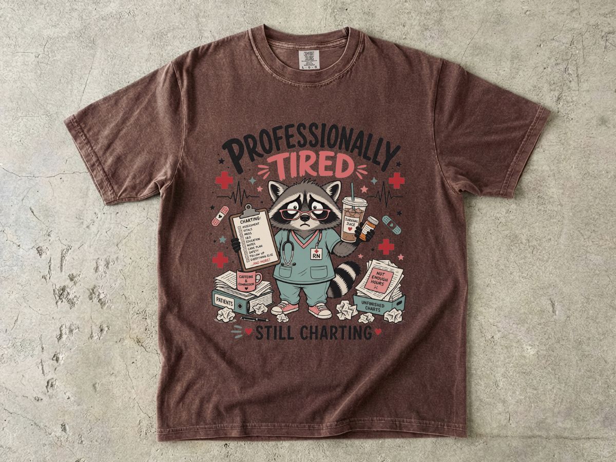 Professionally Tired Still Charting T-Shirt — Cute Raccoon Nurse Medical Tee