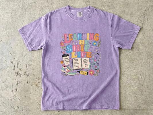 Learning the Shift Life T-Shirt — Retro Nurse & Shift Work Graphic Tee