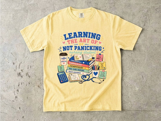 Nursing Student T-Shirt — "Learning the Art of Not Panicking" Study Essentials Tee