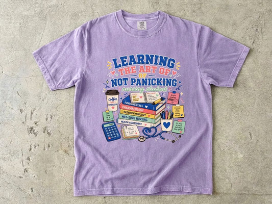Nursing Student T-Shirt — "Learning the Art of Not Panicking" Study Essentials Tee