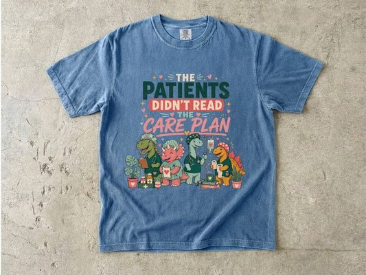 T-Shirt — "The Patients Didn’t Read the Care Plan" Nursing Dino Funny Medical Tee