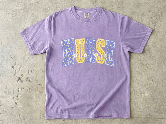 Nurse Varsity Letter Tee – Blue & Yellow Polka Dot Graphic T-Shirt