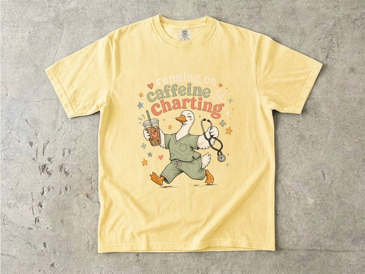 Caffeine & Charting T‑Shirt — Cute Goose Nurse with Coffee Graphic