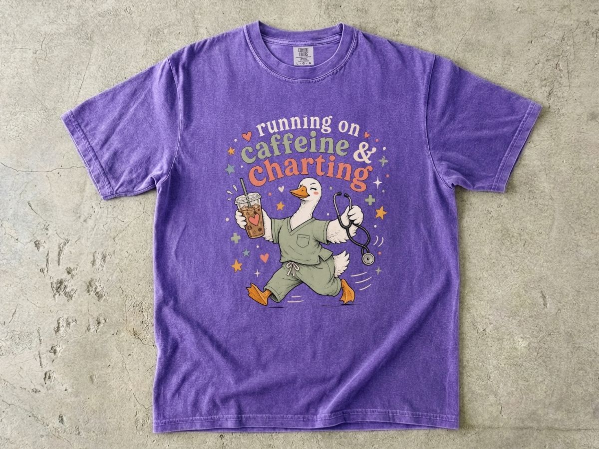 Caffeine & Charting T‑Shirt — Cute Goose Nurse with Coffee Graphic