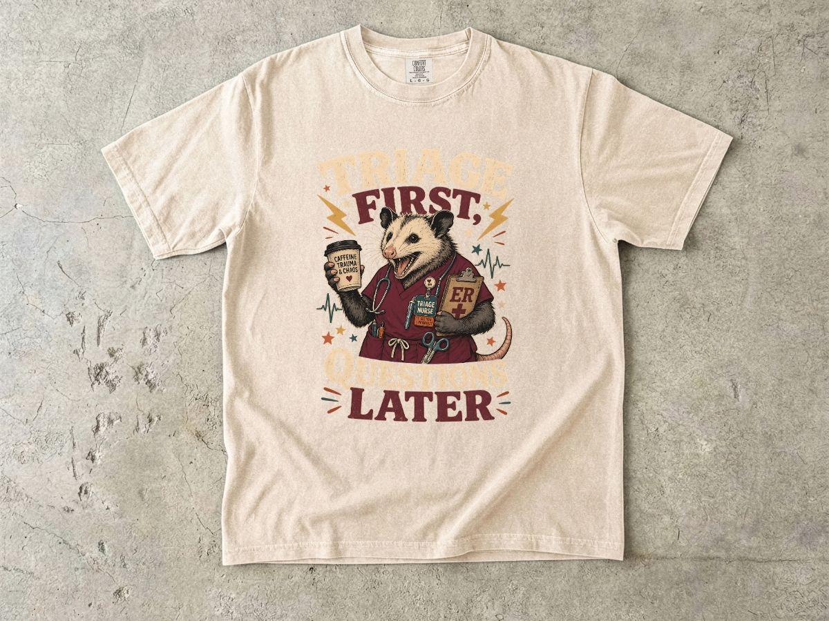 T-Shirt — "Triage First, Questions Later" Plague Doctor Medical Humor Tee