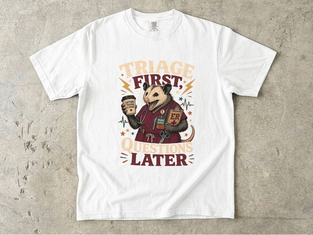 T-Shirt — "Triage First, Questions Later" Plague Doctor Medical Humor Tee