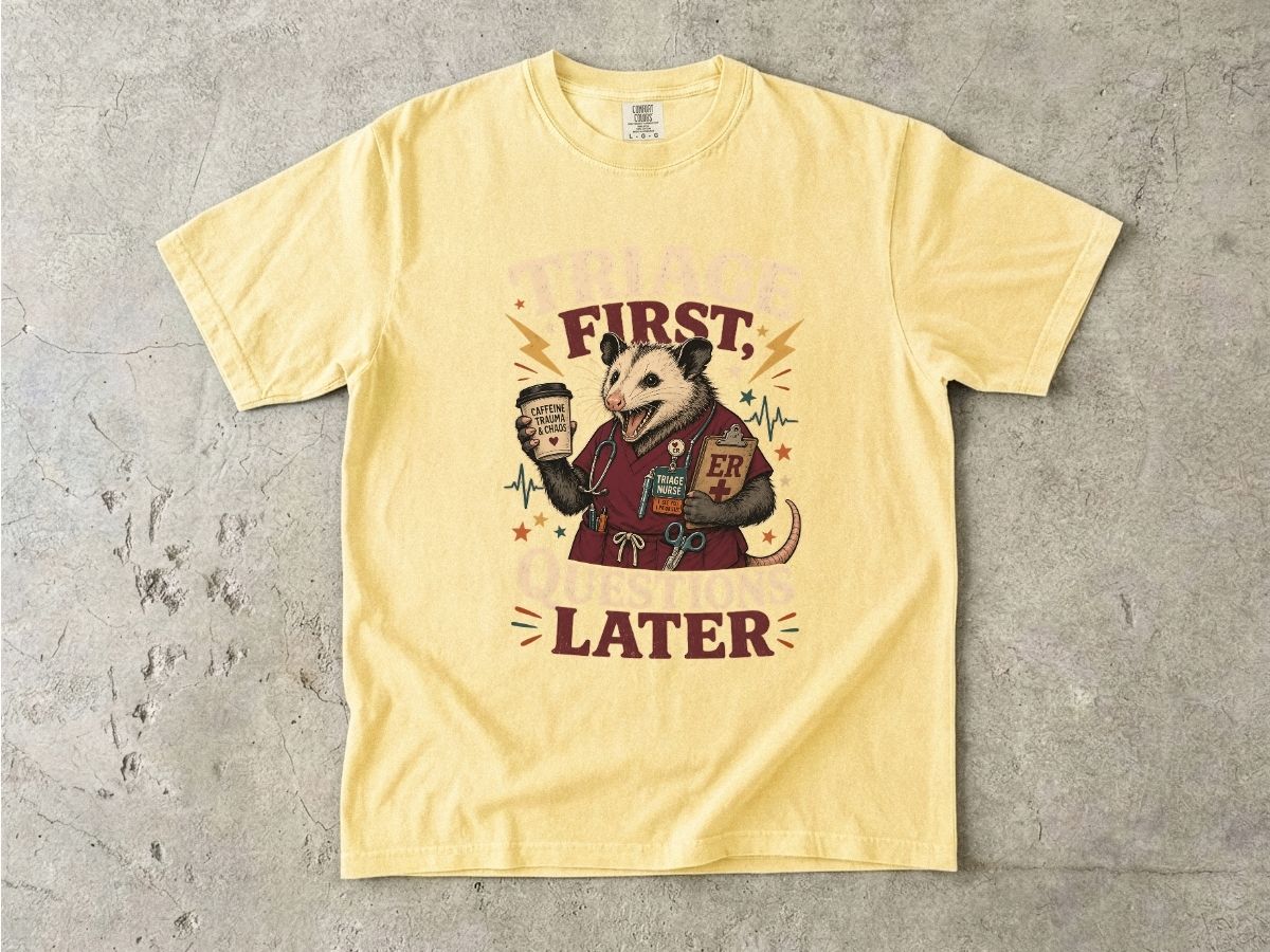 T-Shirt — "Triage First, Questions Later" Plague Doctor Medical Humor Tee