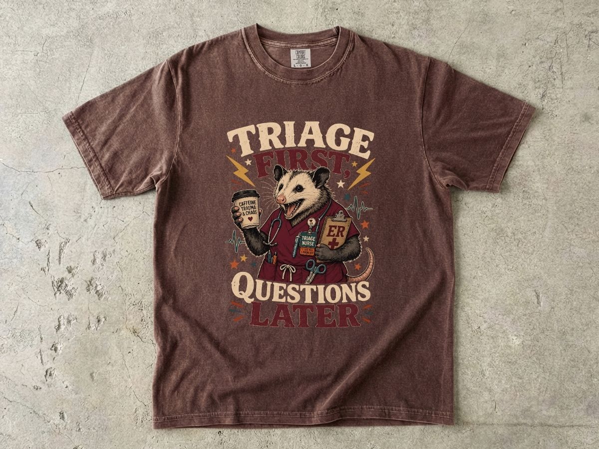T-Shirt — "Triage First, Questions Later" Plague Doctor Medical Humor Tee