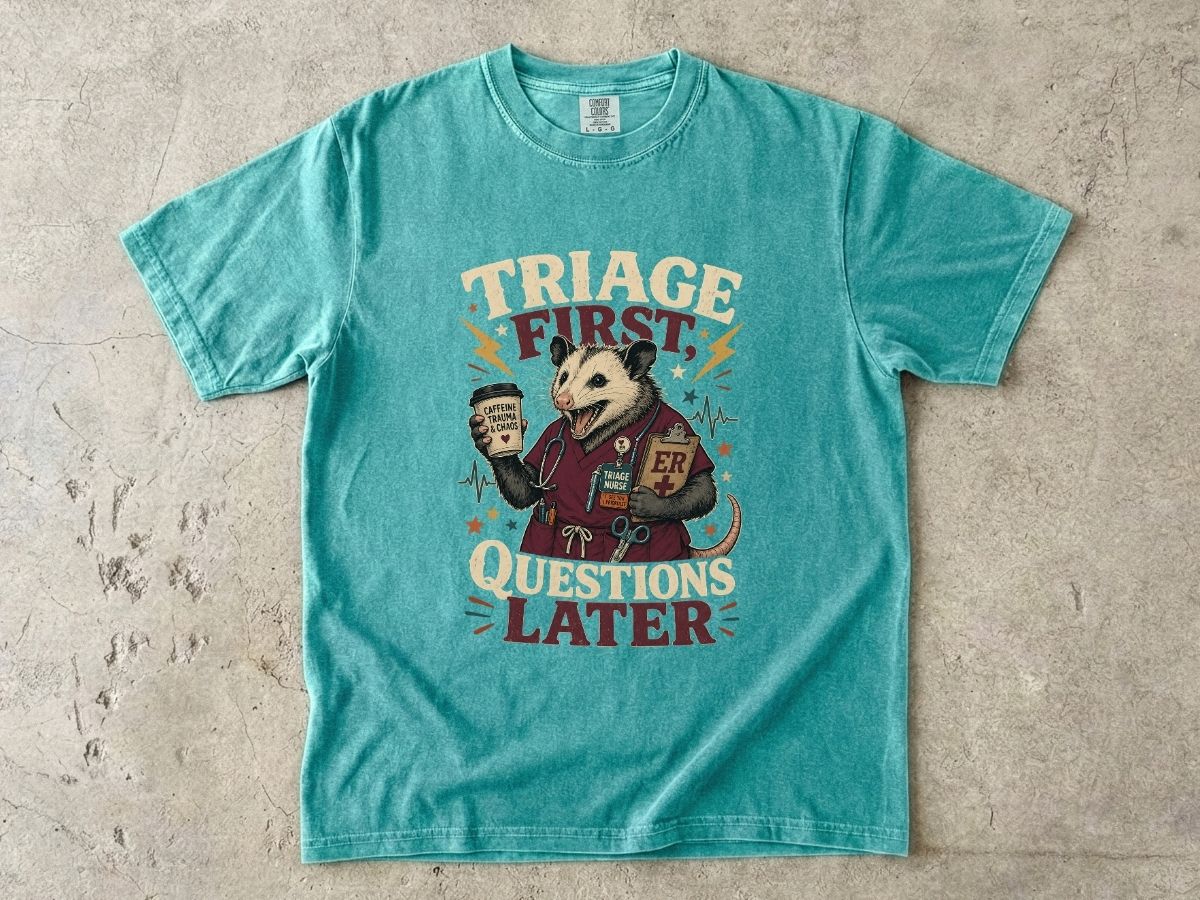 T-Shirt — "Triage First, Questions Later" Plague Doctor Medical Humor Tee